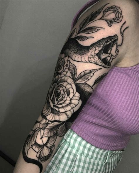 full sleeve snake tattoo.